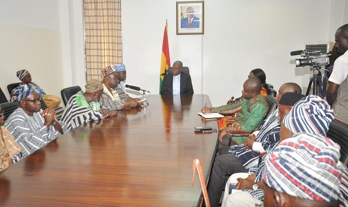 Yagbon Wura Jawula (3rd left) briefing Vice-President Amissah-Arthur (middle) on the funeral arrangement